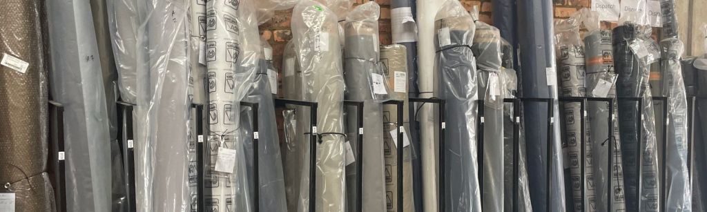 Rolls of fabric including ripstop. 